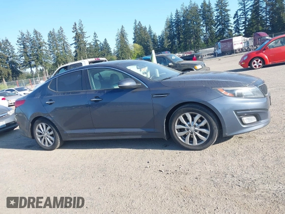 2015 Kia Optima EX with VIN 5XXGN4A77FG368704, listed as a IAAI auction lot 42174674 with 128,963 mi miles. Bid and sale history available at carsss.com. Image 13.