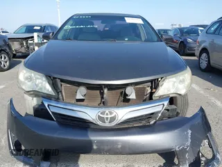 2012 Toyota Camry L z VIN 4T4BF1FK2CR211222, wystawiony jako IAAI lot #41904784 z przebiegiem 157 255 mil mil oraz . Historia ofert i sprzedaży dostępna na DreamBid. Obrazek 13.