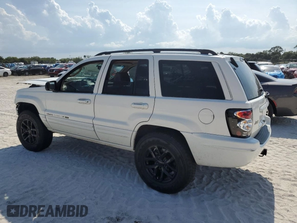 2002 Jeep Grand Cherokee Limited with VIN 1J4GX58S52C121941, listed as a Copart auction lot 55472015 with 182,225 mi miles and Salvage Title. Bid and sale history available at DreamBid. Image 2.