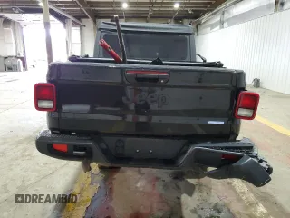 2021 Jeep Gladiator Willys with VIN 1C6HJTAG4ML556255, listed as a Copart auction lot 57143125 with 57,104 mi miles and Salvage title. Bid and sale history available at DreamBid. Image 6.
