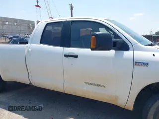 2010 Toyota Tundra SR with VIN 5TFTY5F19AX006696, listed as a IAAI auction lot 42379570 with 332,246 mi miles and . Bid and sale history available at DreamBid. Image 13.