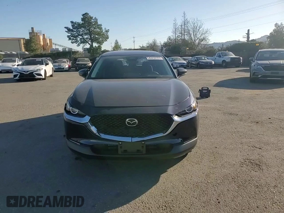 2025 Mazda CX-30 S with VIN 3MVDMBAM5SM751984, listed as a Copart auction lot 43232255 with 2,448 mi miles and Salvage title. Bid and sale history available at DreamBid. Image 11.