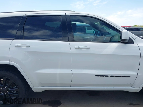 2021 Jeep Grand Cherokee Laredo E with VIN 1C4RJEAG2MC785168, listed as a IAAI auction lot 42115460 with 64,036 mi miles and . Bid and sale history available at DreamBid. Image 14.
