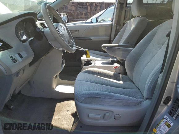 2011 Toyota Sienna LE AAS with VIN 5TDKK3DC6BS054847, listed as a Copart auction lot 64673975 with 197,266 mi miles and Salvage title. Bid and sale history available at DreamBid. Image 7.