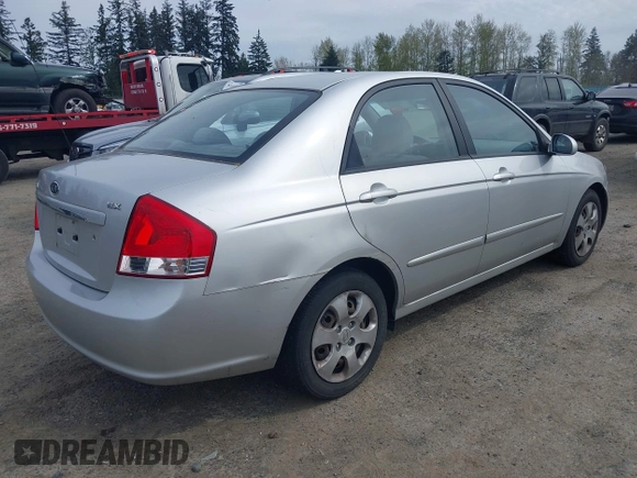 2009 Kia Spectra EX with VIN KNAFE221595659217, listed as a IAAI auction lot 42014406 with 140,527 mi miles. Bid and sale history available at carsss.com. Image 4.