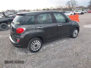 2014 FIAT 500L Easy with VIN ZFBCFABH7EZ028517, listed as a IAAI auction lot 41860321 with 79,665 mi miles and . Bid and sale history available at DreamBid. Image 4.