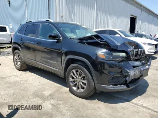2019 Jeep Cherokee Latitude Plus with VIN 1C4PJMLBXKD233718, listed as a Copart auction lot 58933435 with 56,413 mi miles and Salvage title. Bid and sale history available at DreamBid. Image 4.