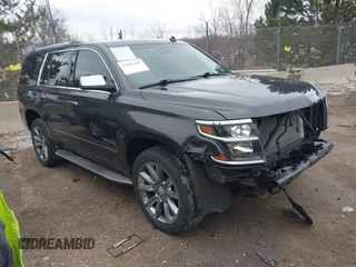 2015 Chevrolet Tahoe LTZ with VIN 1GNSKCKC4FR277659, listed as a IAAI auction lot 42003189 with 137,383 mi miles and . Bid and sale history available at DreamBid. Image 1.