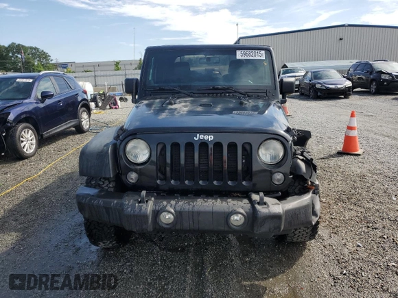 2014 Jeep Wrangler Sport z VIN 1C4AJWAG0EL147523, wystawiony jako Copart lot #59682015 z przebiegiem 196 258 mil mil oraz Szkoda całkowita • Salvage title. Historia ofert i sprzedaży dostępna na DreamBid. Obrazek 5.