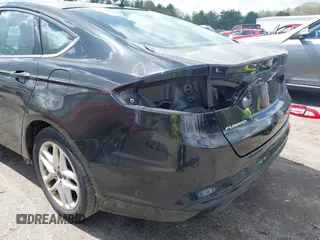 2015 Ford Fusion SE with VIN 1FA6P0H77F5122055, listed as a IAAI auction lot 42198056 with 151,029 mi miles and . Bid and sale history available at DreamBid. Image 16.