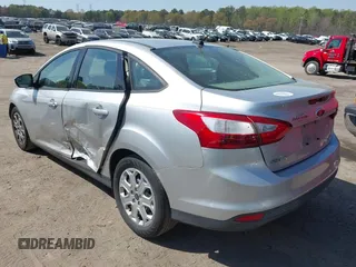 2012 Ford Focus SE with VIN 1FAHP3F29CL377721, listed as a IAAI auction lot 41848786 with 147,709 mi miles. Bid and sale history available at carsss.com. Image 3.