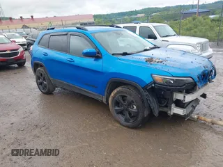 2021 Jeep Cherokee Altitude with VIN 1C4PJMLB7MD117394, listed as a IAAI auction lot 42330963 with 60,230 mi miles and . Bid and sale history available at DreamBid. Image 1.