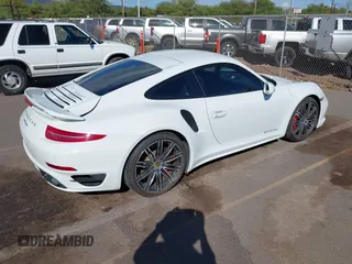 2015 Porsche 911 Turbo S with VIN WP0AD2A98FS167057, listed as a IAAI auction lot 41296392 with 1 mi miles. Bid and sale history available at carsss.com. Image 4.