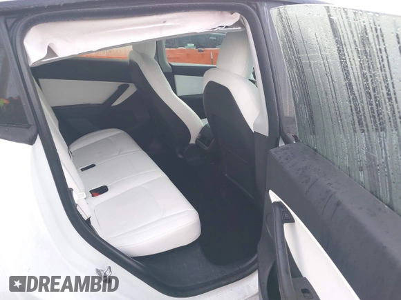 2021 Tesla Model Y Performance z VIN 5YJYGDEF2MF133739, wystawiony jako IAAI lot #41226429 z przebiegiem 58 502 mil mil oraz . Historia ofert i sprzedaży dostępna na DreamBid. Obrazek 8.
