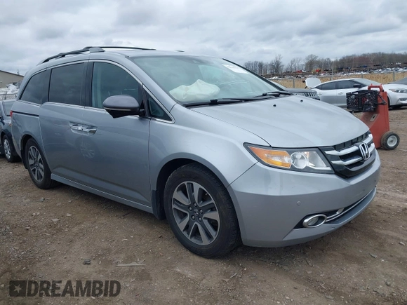2016 Honda Odyssey Touring Elite with VIN 5FNRL5H99GB107896, listed as a IAAI auction lot 42040395 with 162,120 mi miles and . Bid and sale history available at carsss.com. Image 1.