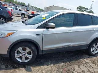 2013 Ford Escape SE z VIN 1FMCU9GX9DUB09981, wystawiony jako IAAI lot #42412927 z przebiegiem 150 499 mil mil oraz . Historia ofert i sprzedaży dostępna na DreamBid. Obrazek 6.