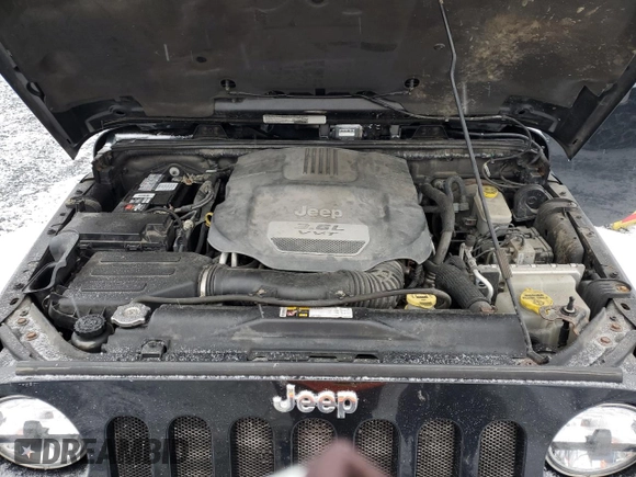 2013 Jeep Wrangler Rubicon 10th Anniversary with VIN 1C4BJWCG6DL507667, listed as a Copart auction lot 84139134 with 264,970 mi miles and Salvage Title. Bid and sale history available at DreamBid. Image 12.