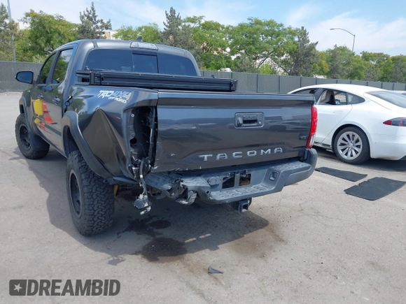 2019 Toyota Tacoma SR with VIN 3TMCZ5AN3KM207783, listed as a IAAI auction lot 42375280 with 55,784 mi miles and . Bid and sale history available at DreamBid. Image 6.