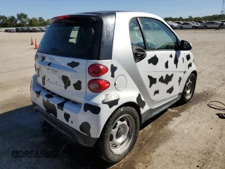 2013 Smart fortwo Pure z VIN WMEEJ3BA5DK694853, wystawiony jako Copart lot #74003734 z przebiegiem 27 720 mil mil oraz Szkoda całkowita • Salvage title. Historia ofert i sprzedaży dostępna na DreamBid. Obrazek 3.