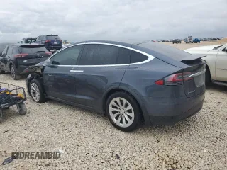 2017 Tesla Model X 90D with VIN 5YJXCBE26HF079246, listed as a Copart auction lot 50141605 with 68,905 mi miles and Salvage Title. Bid and sale history available at DreamBid. Image 2.