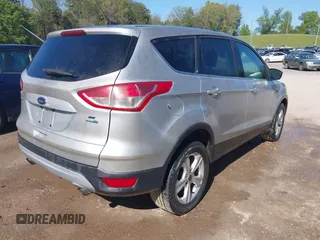 2014 Ford Escape SE with VIN 1FMCU9GX6EUB22401, listed as a IAAI auction lot 42038712 with Not Provided miles and . Bid and sale history available at carsss.com. Image 4.