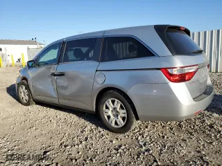 2012 Honda Odyssey LX with VIN 5FNRL5H23CB029435, listed as a Copart auction lot 48216405 with 214,862 mi miles and Salvage Title. Bid and sale history available at carsss.com. Image 2.