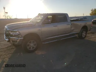 2021 Ram 2500 Big Horn with VIN 3C6UR5JL3MG620945, listed as a Copart auction lot 76048024 with 77,382 mi miles and Salvage Title. Bid and sale history available at carsss.com. Image 1.