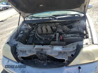 2003 Mercury Sable LS with VIN 1MEHM55S73A619013, listed as a Copart auction lot 73504154 with 200,135 mi miles and Salvage Title. Bid and sale history available at DreamBid. Image 12.