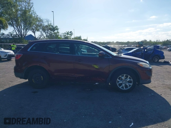 2011 Mazda CX-9 Touring with VIN JM3TB2CA6B0328864, listed as a IAAI auction lot 42029203 with 98,022 mi miles and . Bid and sale history available at DreamBid. Image 14.