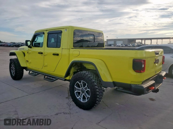 2024 Jeep Gladiator Mojave with VIN 1C6JJTEG8RL104585, listed as a Copart auction lot 66293495 with 7,528 mi miles and Salvage title. Bid and sale history available at DreamBid. Image 2.