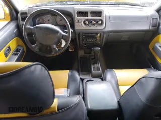 2001 Nissan Frontier SE z VIN 1N6ED27T91C326124, wystawiony jako Copart lot #50929905 z przebiegiem 212 615 mil mil oraz Szkoda całkowita • Salvage title. Historia ofert i sprzedaży dostępna na DreamBid. Obrazek 8.