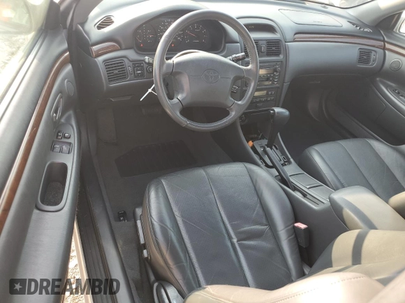 2000 Toyota Solara SE z VIN 2T1CF28P5YC267645, wystawiony jako Copart lot #60543605 z przebiegiem 58 938 mil mil oraz Szkoda całkowita • Salvage title. Historia ofert i sprzedaży dostępna na DreamBid. Obrazek 8.