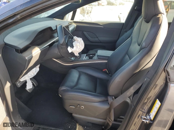 2022 Tesla Model X with VIN 7SAXCBE50NF329346, listed as a Copart auction lot 63855264 with 0 mi miles and Salvage Title. Bid and sale history available at carsss.com. Image 7.