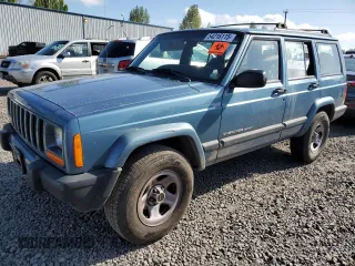 1999 Jeep Cherokee Sport with VIN 1J4FT68S1XL577603, listed as a Copart auction lot 54216115 with 180,128 mi miles and Salvage title. Bid and sale history available at DreamBid. Image 1.