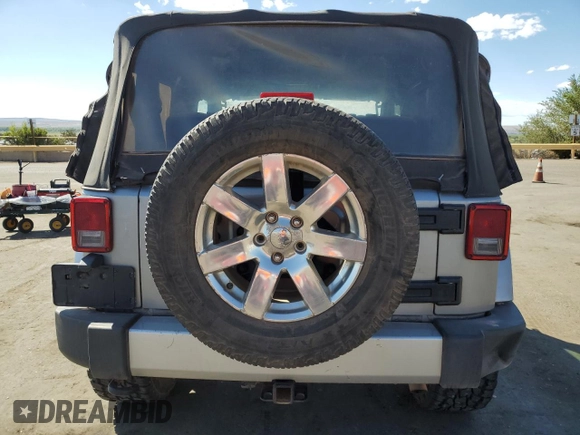 2015 Jeep Wrangler Sahara с VIN 1C4AJWBG1FL742588, выставлен на аукционе Copart как лот 72400274 с пробегом 139 520 миль миль и Списание • Salvage title. История ставок и продаж доступна на DreamBid. Изображение 6.