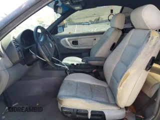 1998 BMW 3 Series 323i with VIN WBABJ8339WEM22707, listed as a Copart auction lot 55623685 with 130,704 mi miles and Salvage title. Bid and sale history available at DreamBid. Image 7.