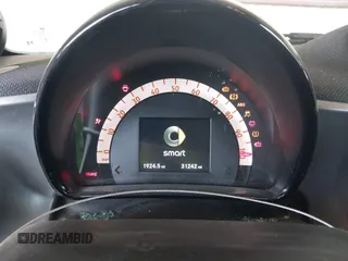 2017 Smart fortwo Pure z VIN WMEFJ9BA8HK231165, wystawiony jako IAAI lot #42238753 z przebiegiem 31 242 mil mil oraz . Historia ofert i sprzedaży dostępna na DreamBid. Obrazek 15.