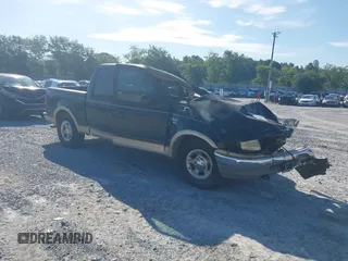 2001 Ford F-150 XLT with VIN 1FTRW07W91KE10334, listed as a IAAI auction lot 42730517 with Not provided miles and . Bid and sale history available at DreamBid. Image 1.