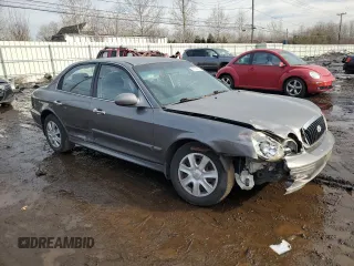 2002 Hyundai Sonata with VIN KMHWF25H52A617339, listed as a Copart auction lot 46359015 with 135,828 mi miles and Salvage Title. Bid and sale history available at carsss.com. Image 4.
