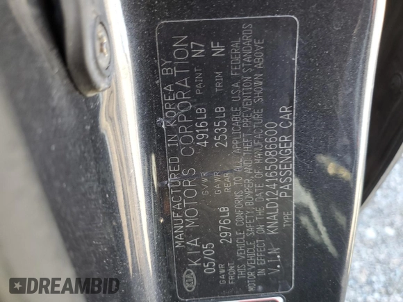 2006 Kia Amanti z VIN KNALD124165086600, wystawiony jako Copart lot #79354294 z przebiegiem 110 537 mil mil oraz Tytuł czysty. Historia ofert i sprzedaży dostępna na DreamBid. Obrazek 12.