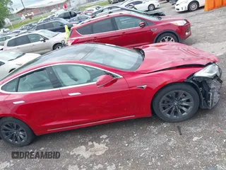 2018 Tesla Model S 75D with VIN 5YJSA1E21JF275546, listed as a IAAI auction lot 42061595 with Not Provided miles and . Bid and sale history available at DreamBid. Image 13.