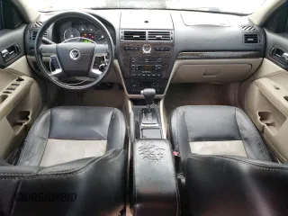 2007 Mercury Milan Premier z VIN 3MEHM02137R607144, wystawiony jako Copart lot #45166215 z przebiegiem 193 794 mil mil oraz Szkoda całkowita • Salvage title. Historia ofert i sprzedaży dostępna na DreamBid. Obrazek 8.