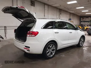 2016 Kia Sorento SX with VIN 5XYPKDA51GG077698, listed as a IAAI auction lot 41501354 with 185,494 mi miles. Bid and sale history available at carsss.com. Image 4.
