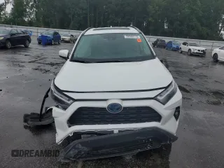 2024 Toyota RAV4 Hybrid XLE Premium with VIN 2T3B6RFV8RW074600, listed as a Copart auction lot 59560115 with 23,839 mi miles and Salvage title. Bid and sale history available at DreamBid. Image 5.