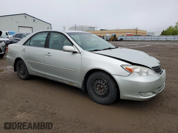 2004 Toyota Camry LE with VIN 4T1BE30K64U323377, listed as a Copart auction lot 58249465 with 274,902 mi miles and Salvage title. Bid and sale history available at DreamBid. Image 4.