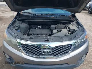 2011 Kia Sorento LX with VIN 5XYKTCA14BG056447, listed as a IAAI auction lot 42212972 with 207,258 mi miles. Bid and sale history available at carsss.com. Image 10.