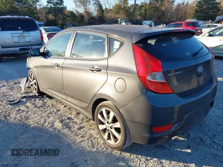 2012 Hyundai Accent SE with VIN KMHCU5AE6CU024465, listed as a IAAI auction lot 41591162 with 168,574 mi miles. Bid and sale history available at carsss.com. Image 3.