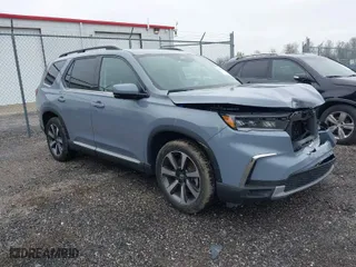 2024 Honda Pilot Elite with VIN 5FNYG1H89RB028392, listed as a IAAI auction lot 42031042 with 18,685 mi miles. Bid and sale history available at carsss.com. Image 1.