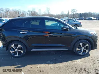 2018 Hyundai Tucson Value with VIN KM8J3CA26JU700642, listed as a IAAI auction lot 41655085 with 80,903 mi miles. Bid and sale history available at carsss.com. Image 13.