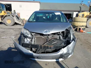 2012 Toyota Sienna with VIN 5TDKA3DC7CS015592, listed as a IAAI auction lot 40839775 with 161,944 mi miles and . Bid and sale history available at DreamBid. Image 13.